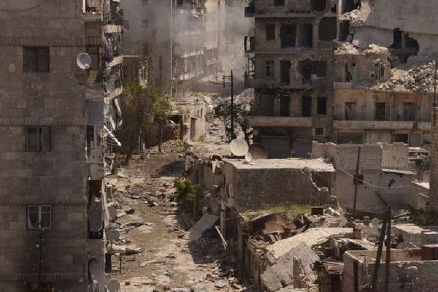Разрушенная сирия. Сирия здания Алеппо. Руины Алеппо. Город Хомс Сирия.