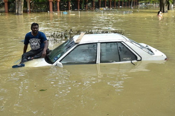 В Малайзии в результате сильнейшего наводнения погибли 14 человек - Фото 1
